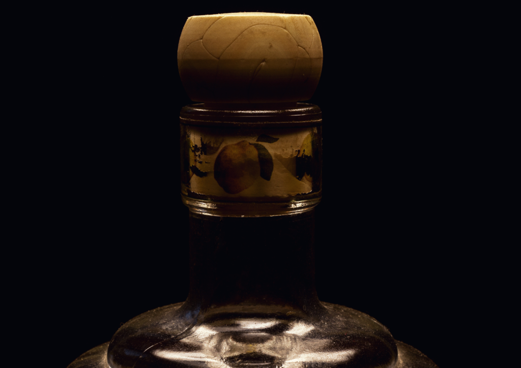 Detail of the capsulated cork of a luxury spirit drink bottle